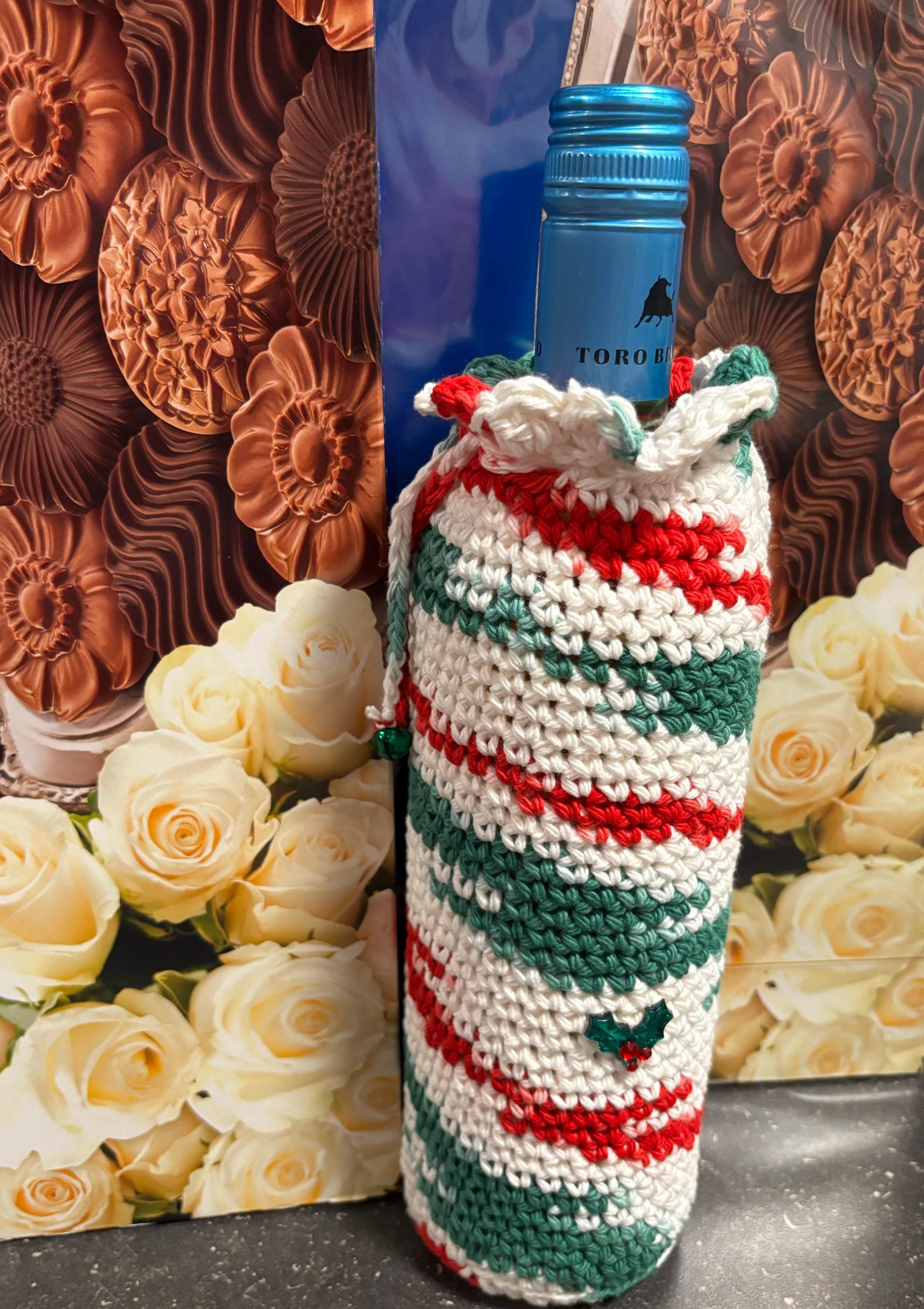 Crochet wine bottle sleeve.