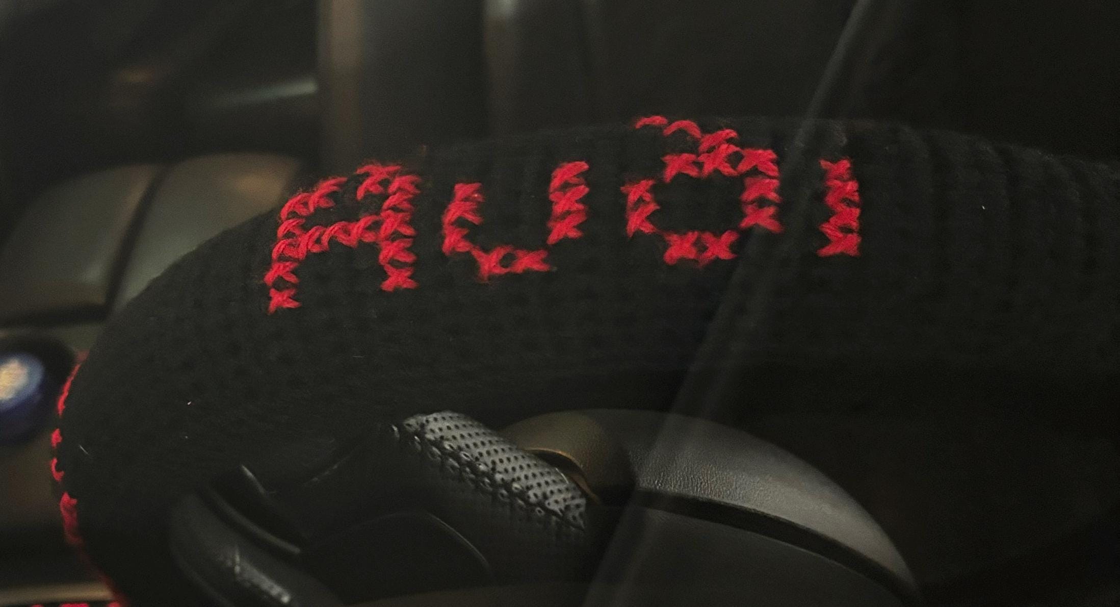 Crochet steering wheel cover.