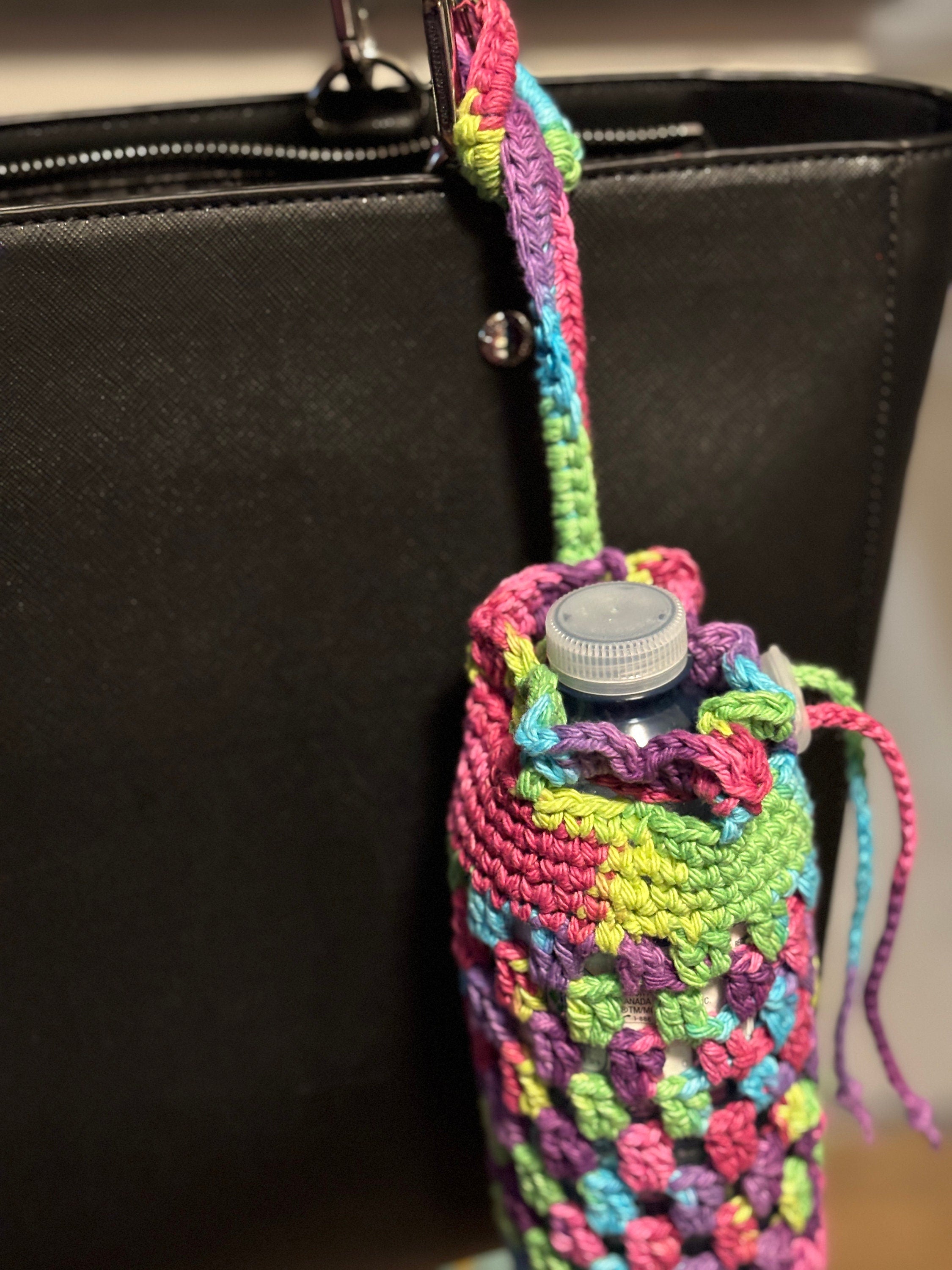 Rainbow crochet water bottle holder.