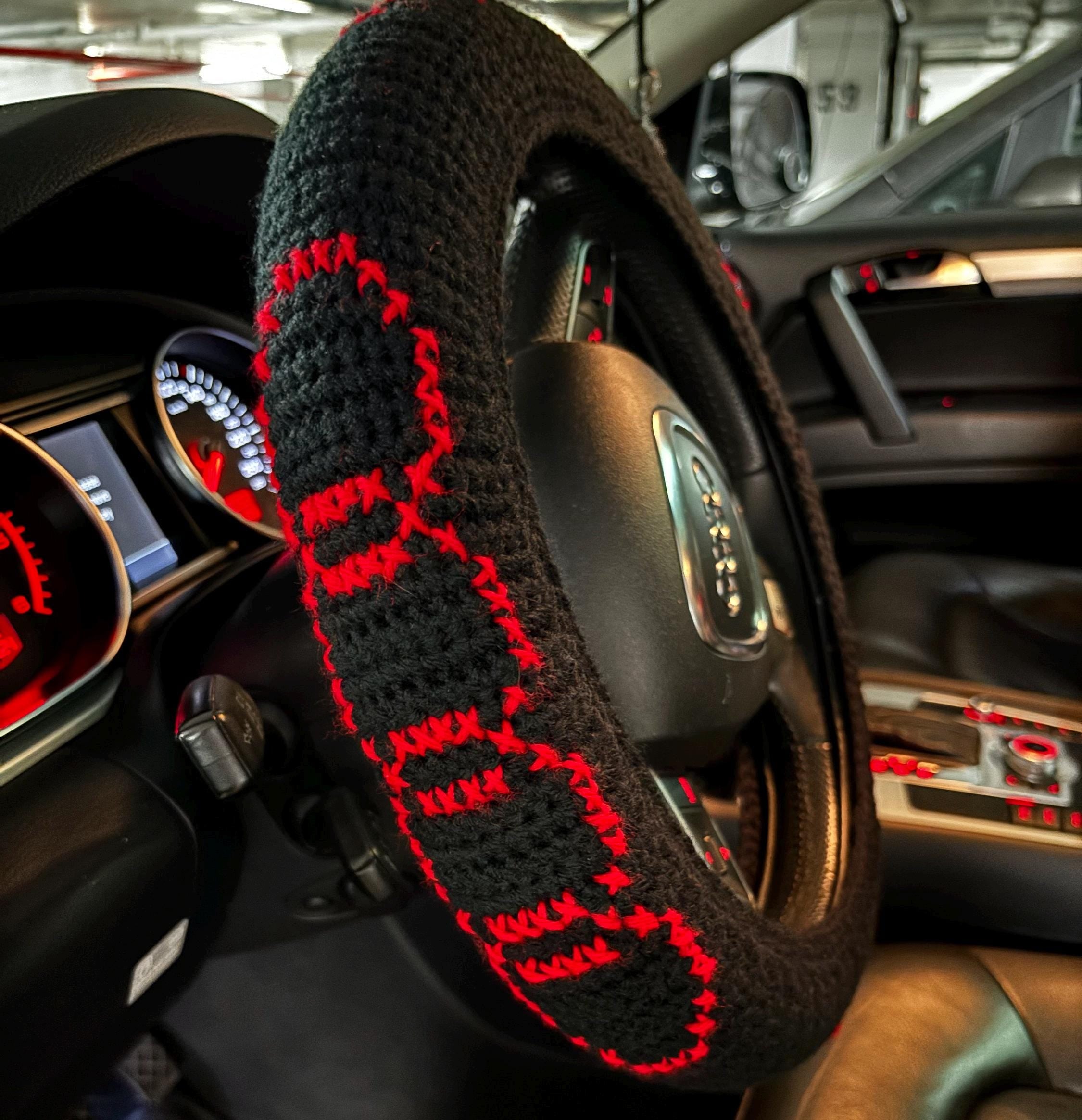 Crochet steering wheel cover.