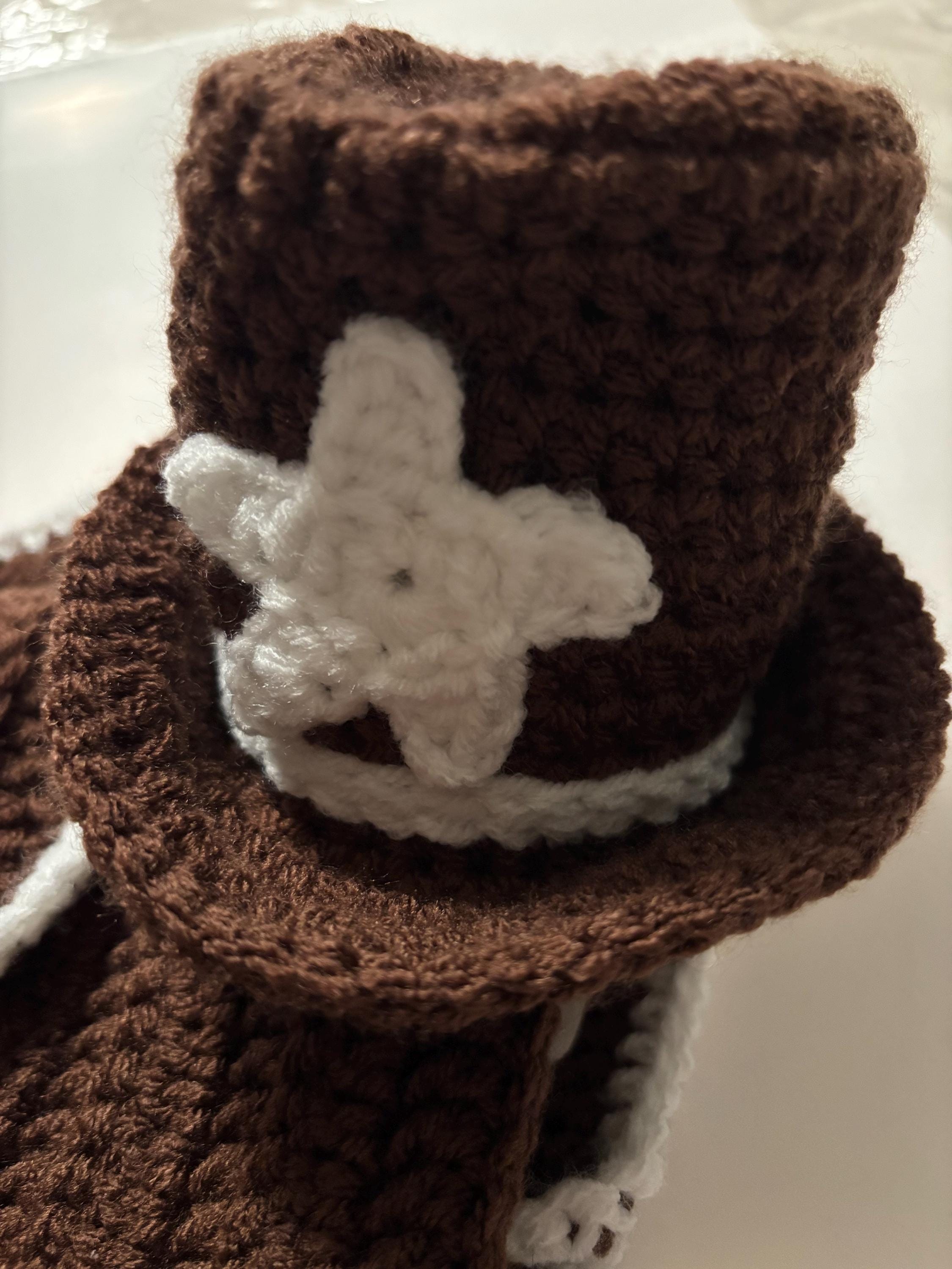 Crochet cowboy baby set.