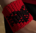 Albanian flag crochet wrist band.