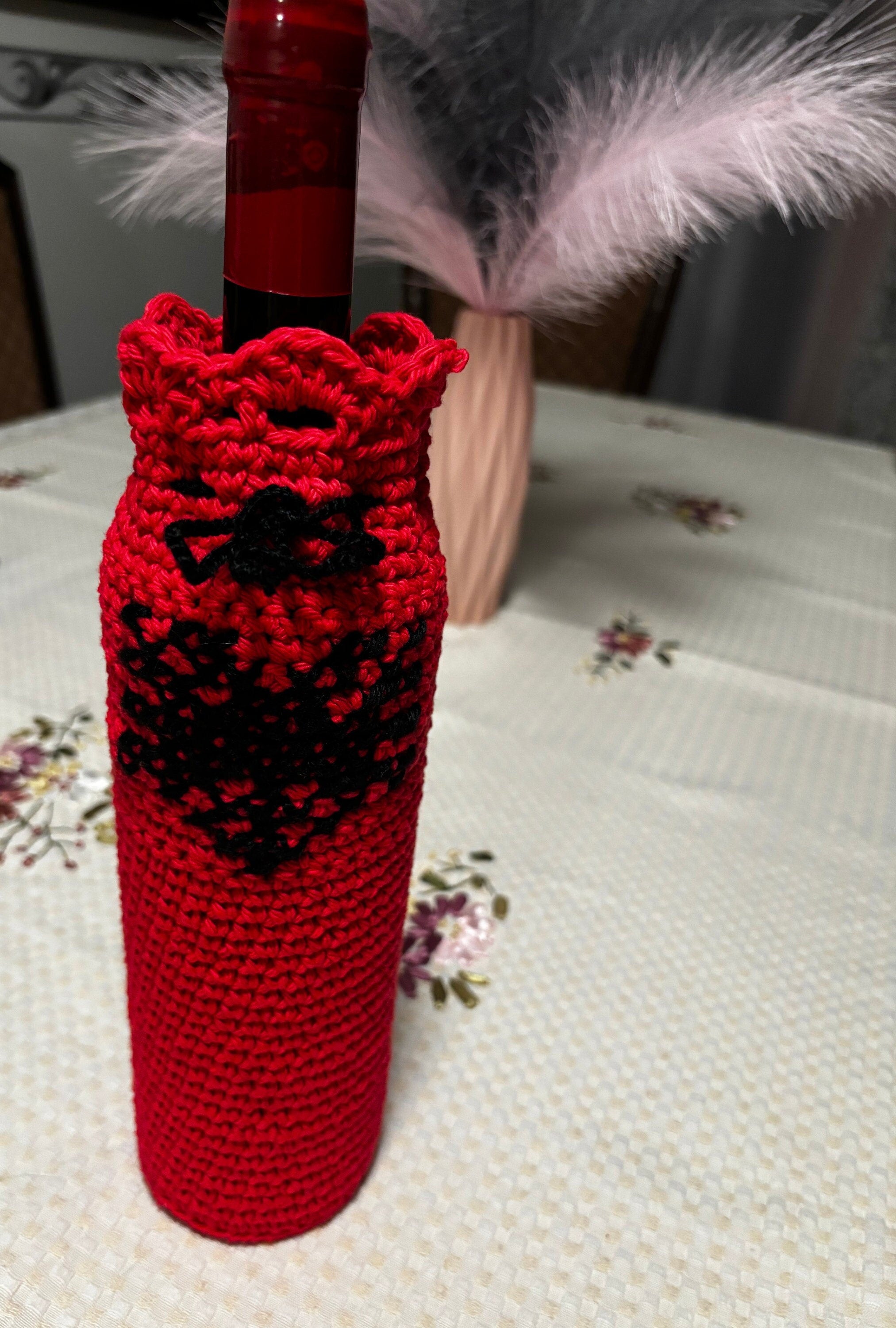 Crochet wine bottle sleeve.