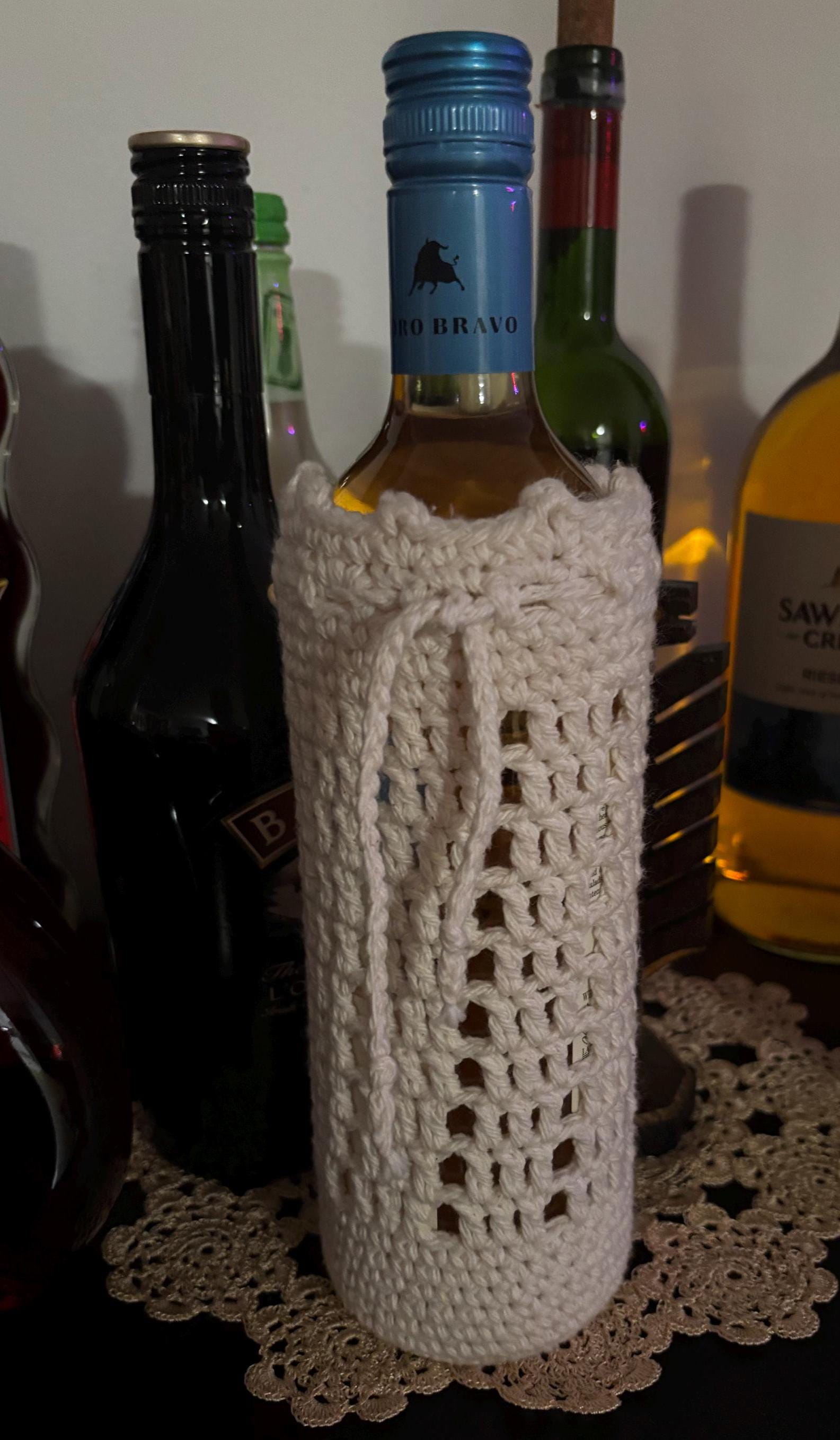 Crochet wine bottle sleeve.