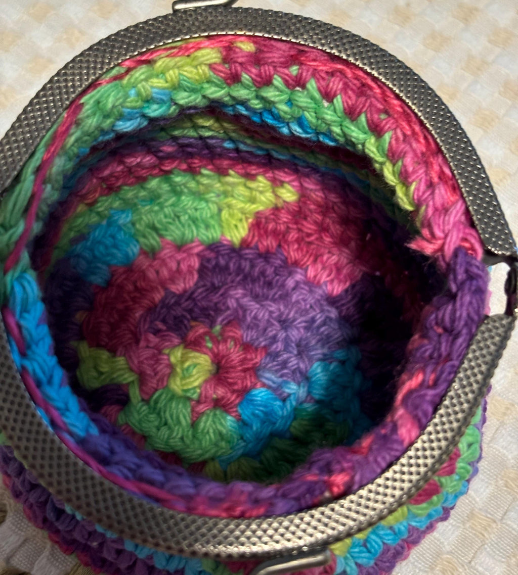 Rainbow crochet coin purse and hand sanitizer holder set.