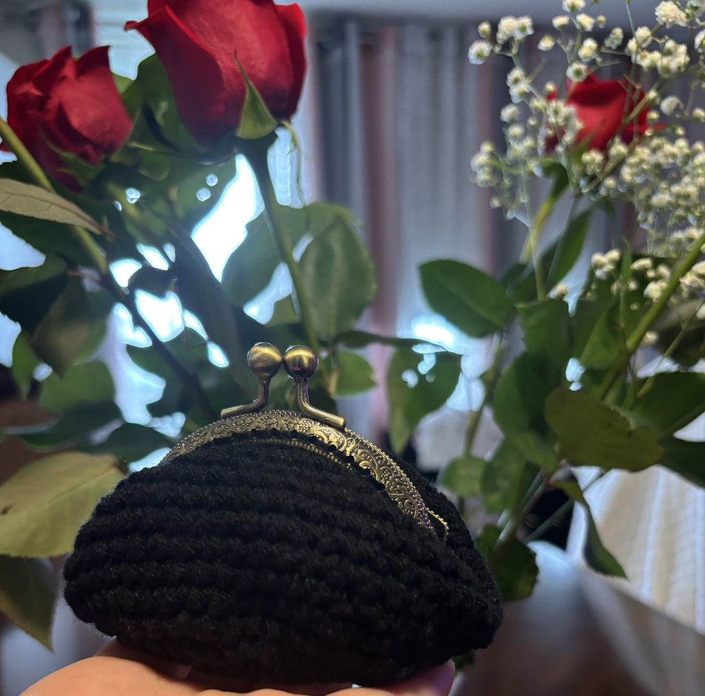 Crochet coin purse.
