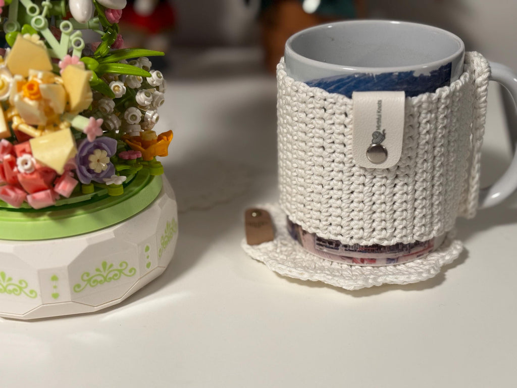 Crochet mug sleeve and coaster set.
