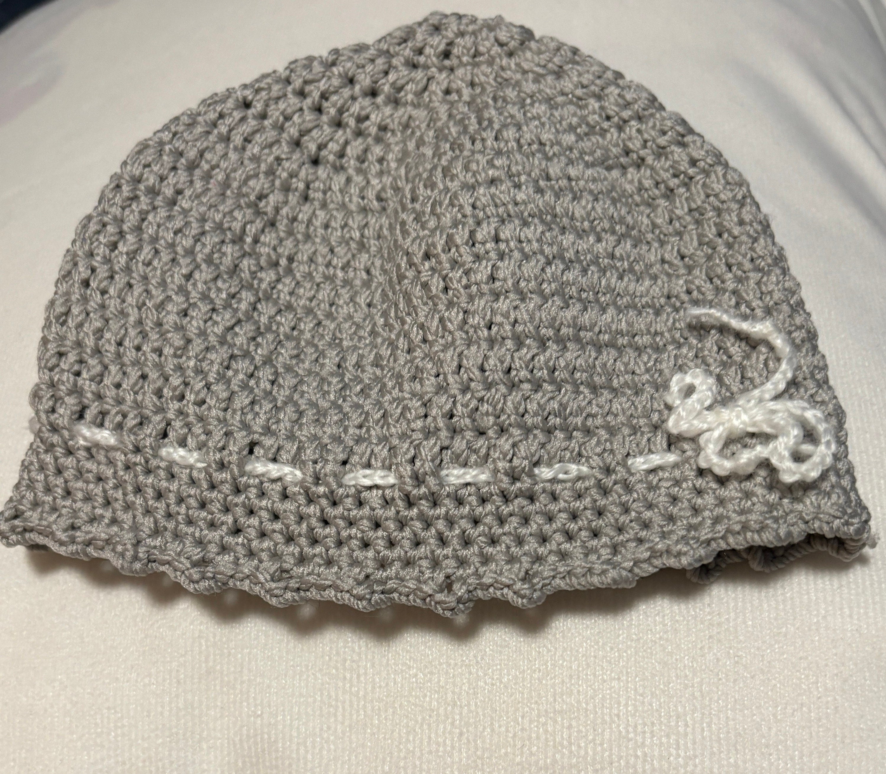 Crochet baby hat, mittens and socks set.
