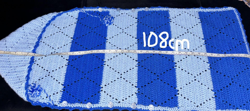 Crochet baby hooded envelope blanket.