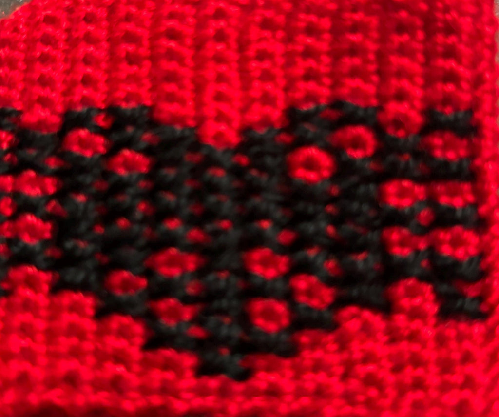 Albanian flag crochet wrist band.