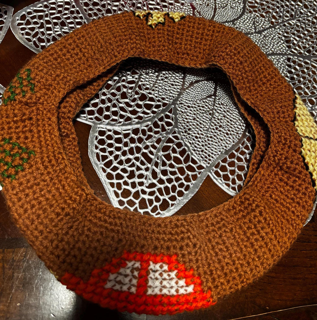 Crochet steering wheel cover.