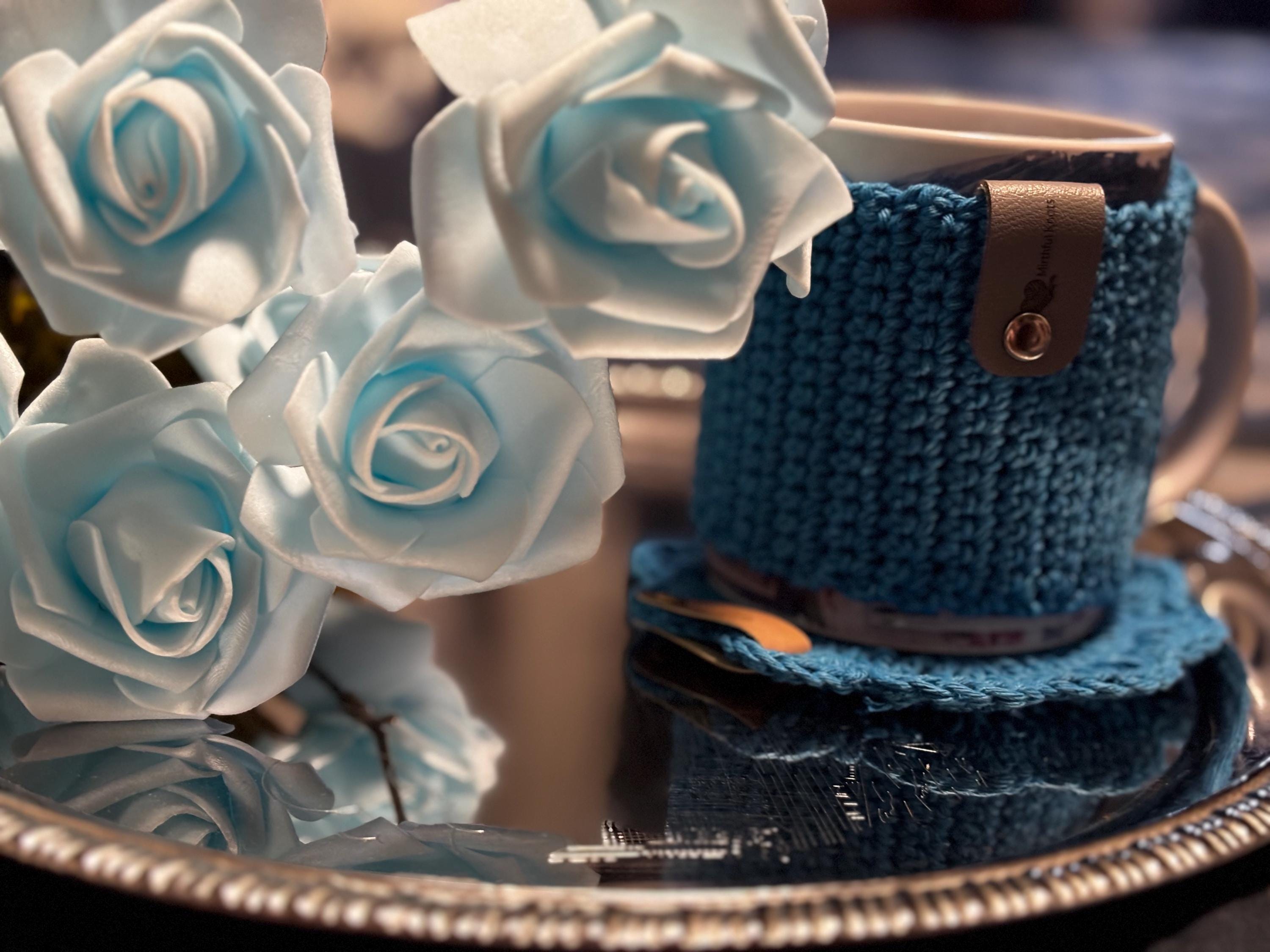 Crochet mug sleeve and coaster set.