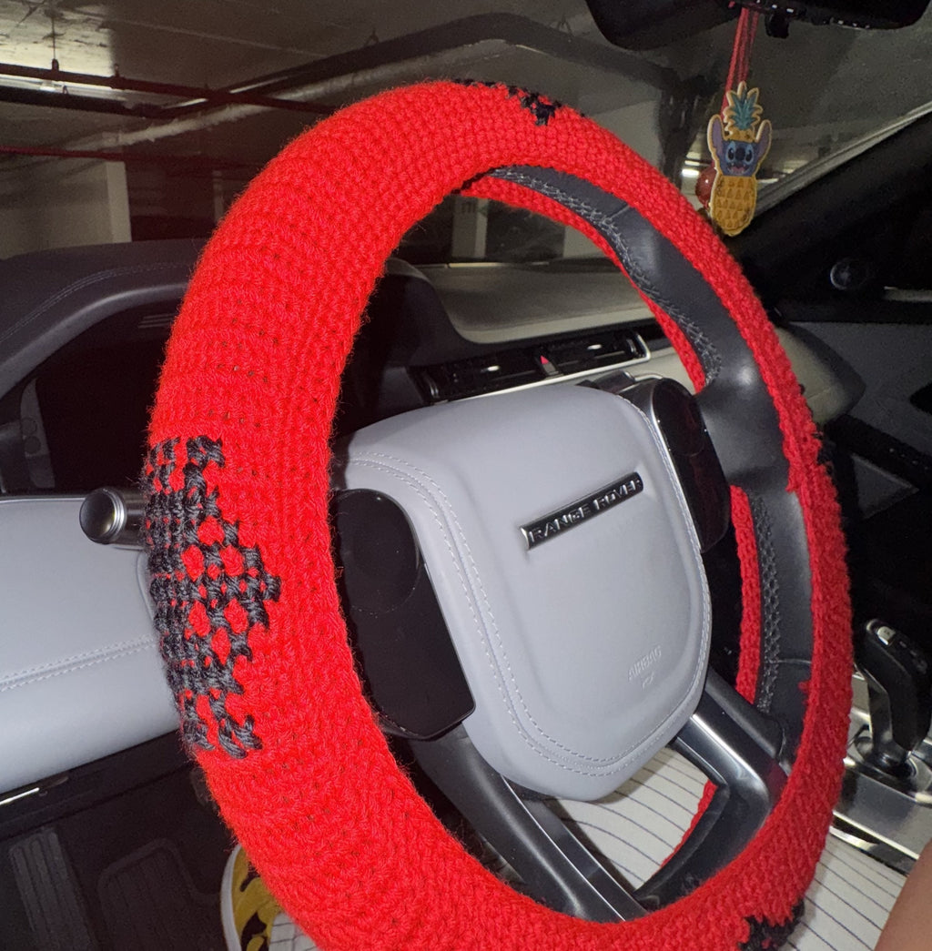 Crochet steering wheel cover.