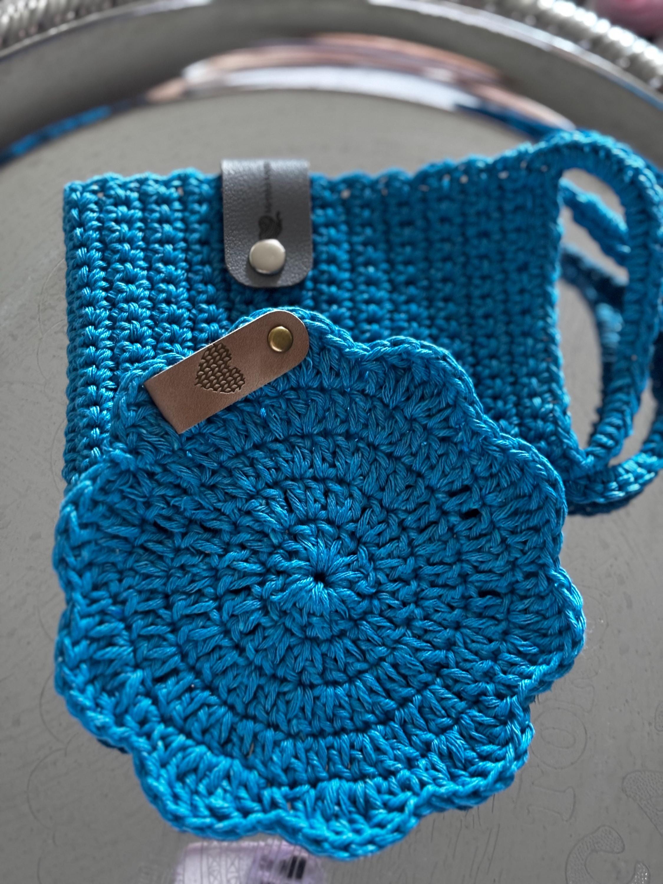 Crochet mug sleeve and coaster set.