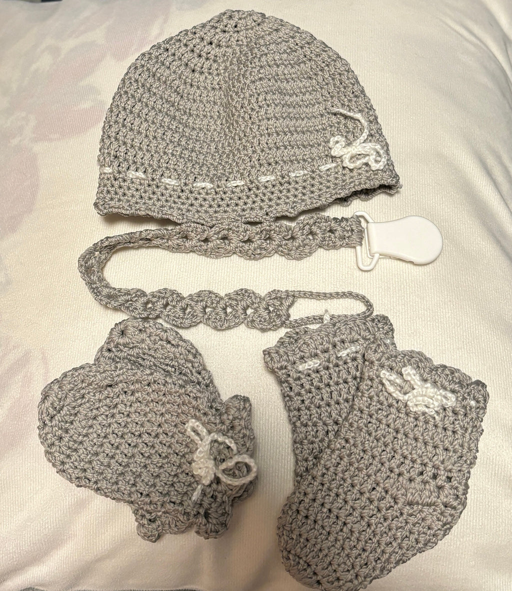 Crochet baby hat, mittens and socks set.