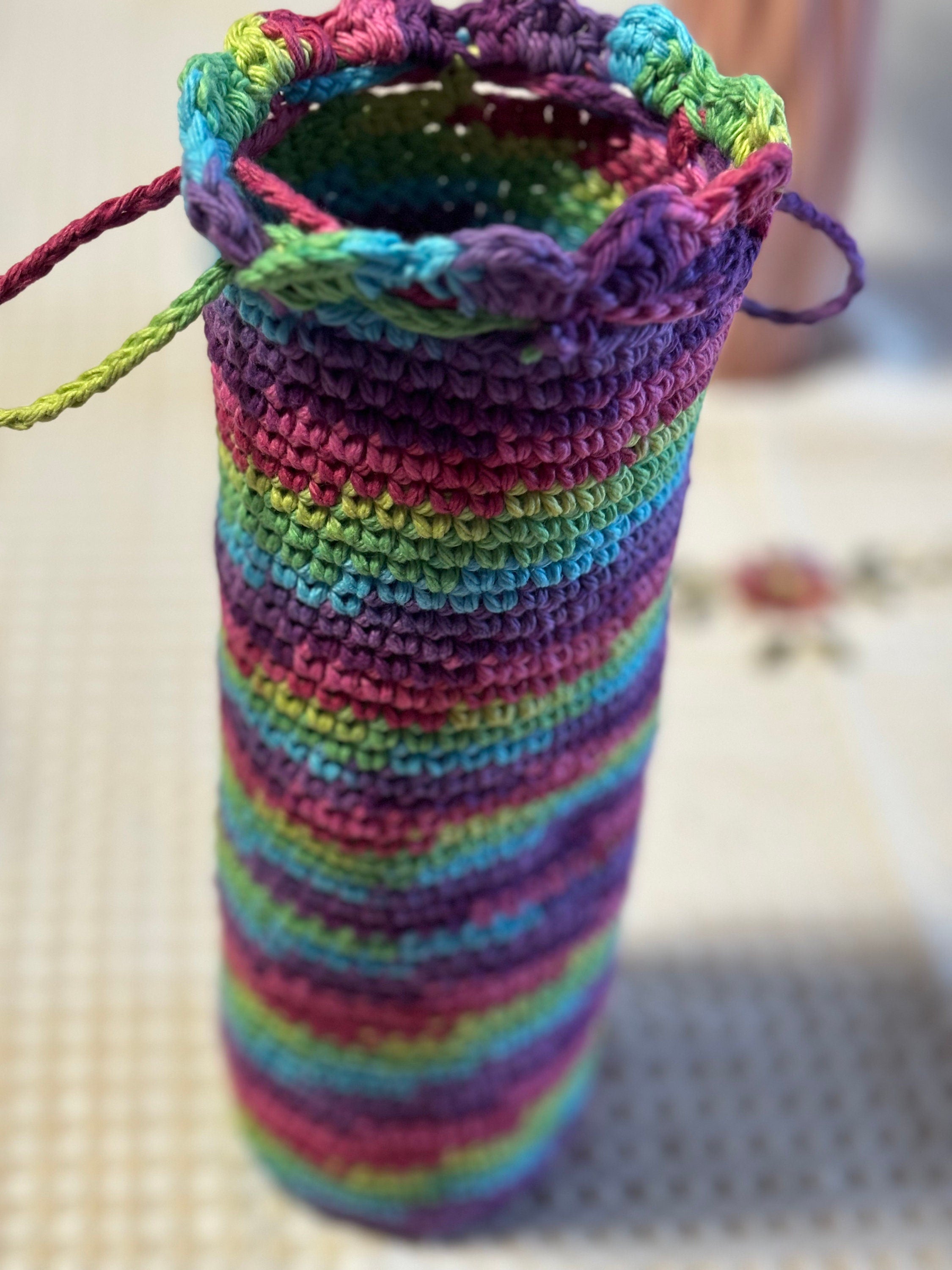 Crochet wine bottle sleeve.
