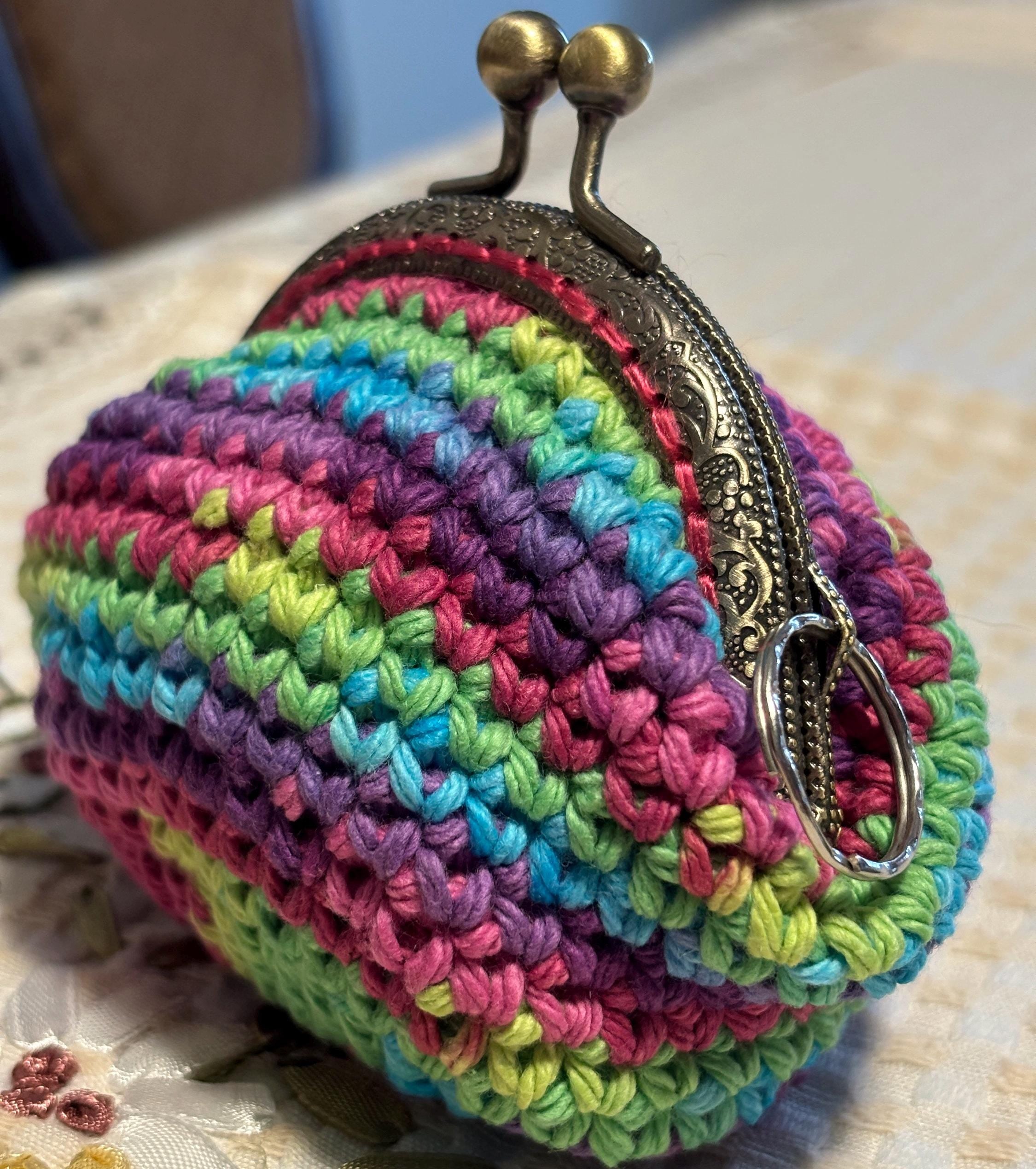Rainbow crochet coin purse and hand sanitizer holder set.