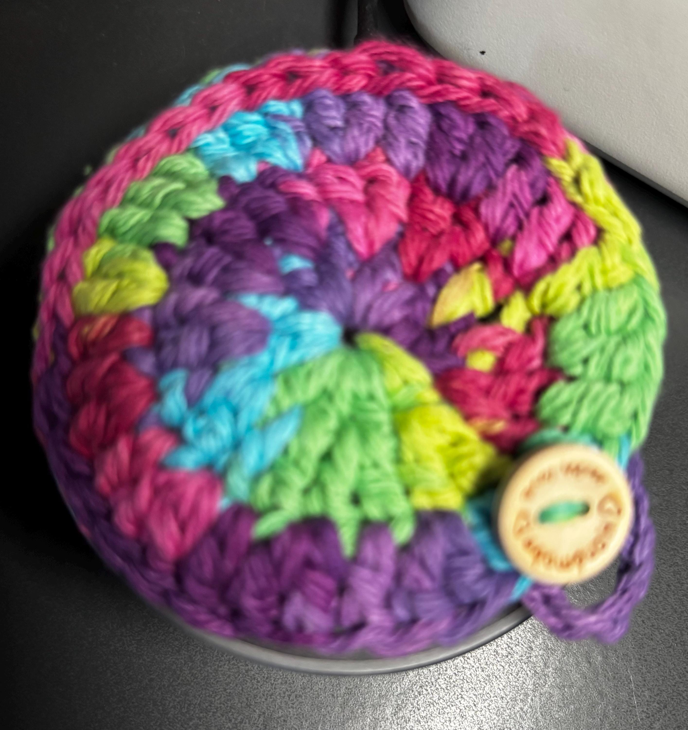 Crochet pizza cutter cover.
