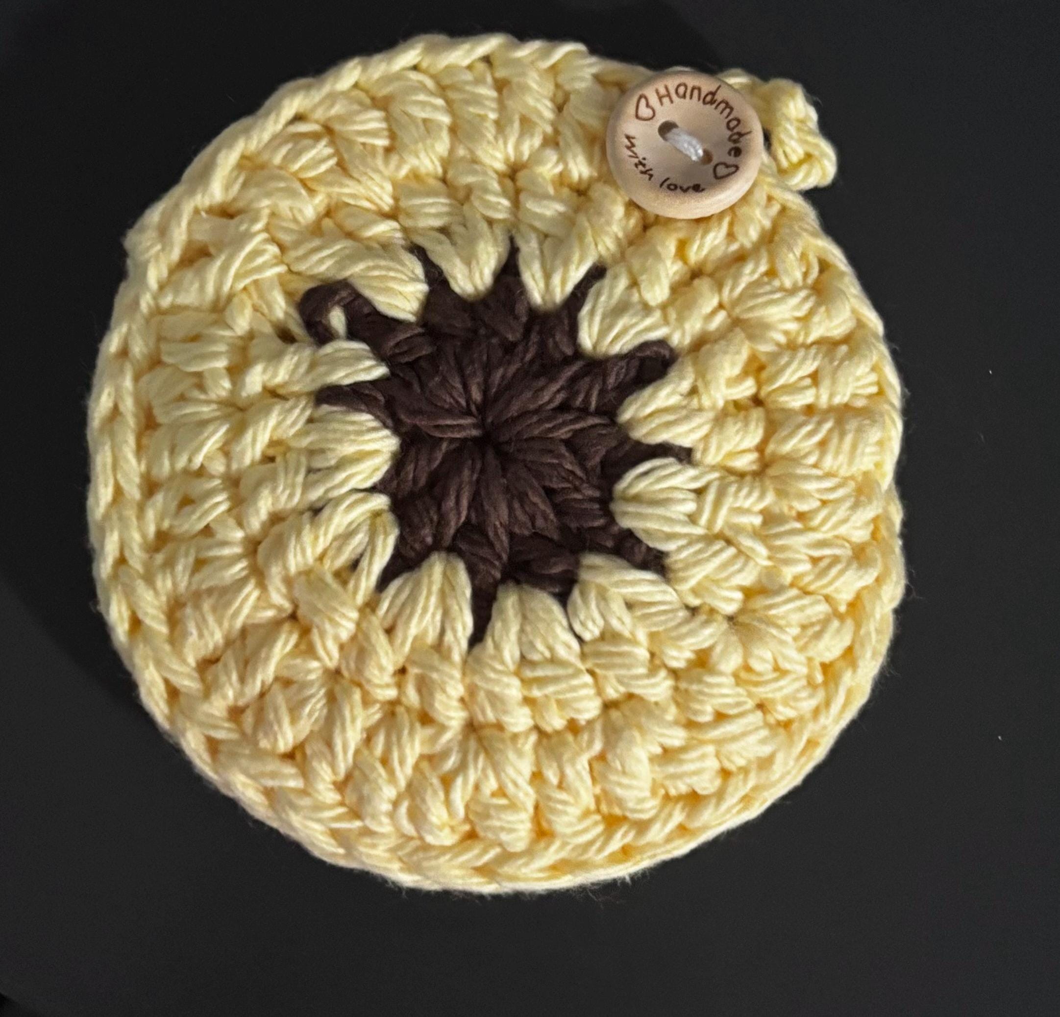 Crochet pizza cutter cover.