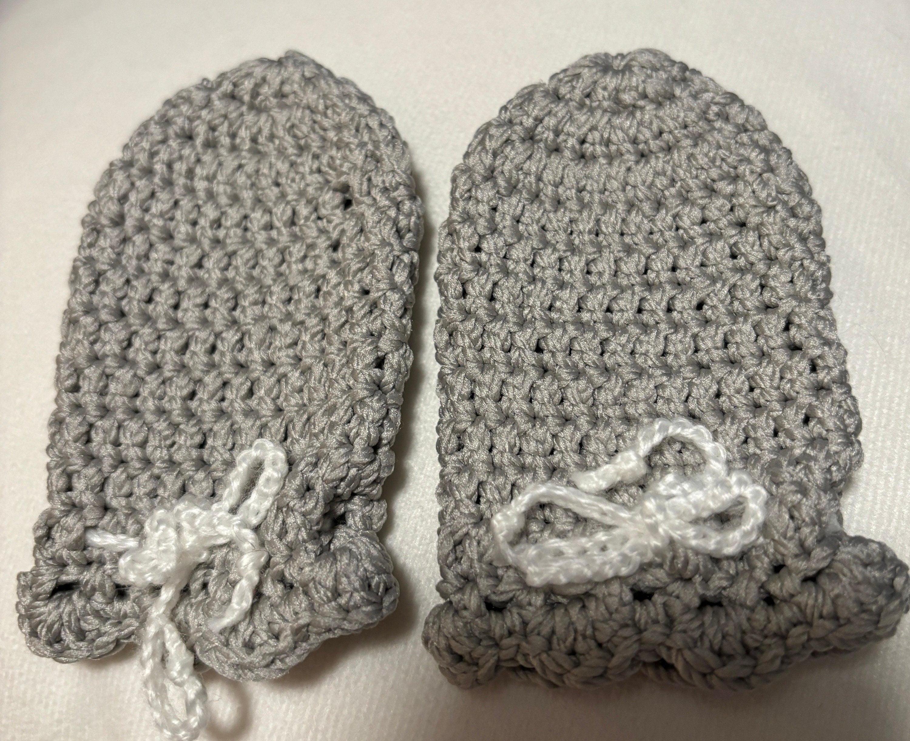 Crochet baby hat, mittens and socks set.