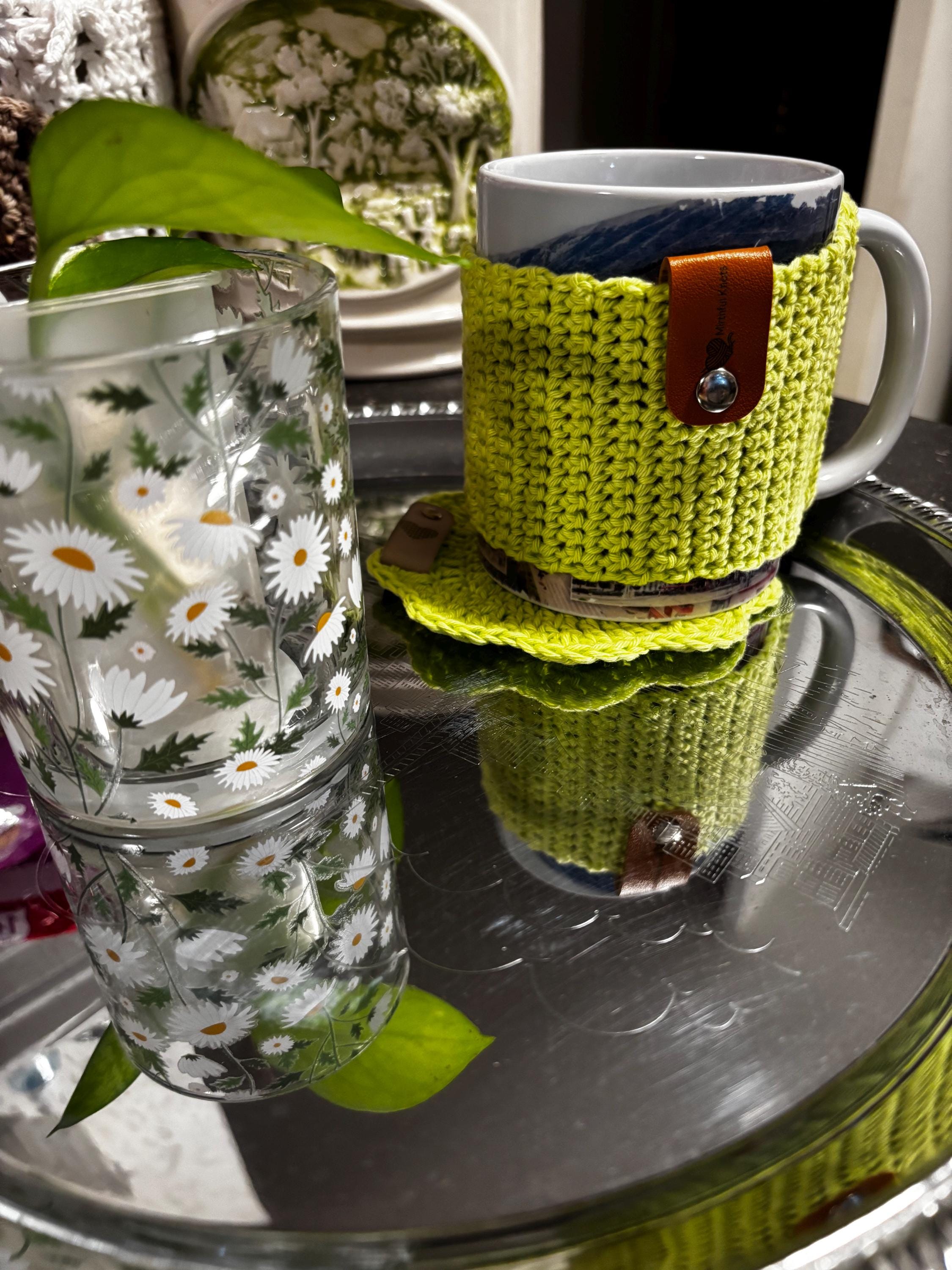 Crochet mug sleeve and coaster set.