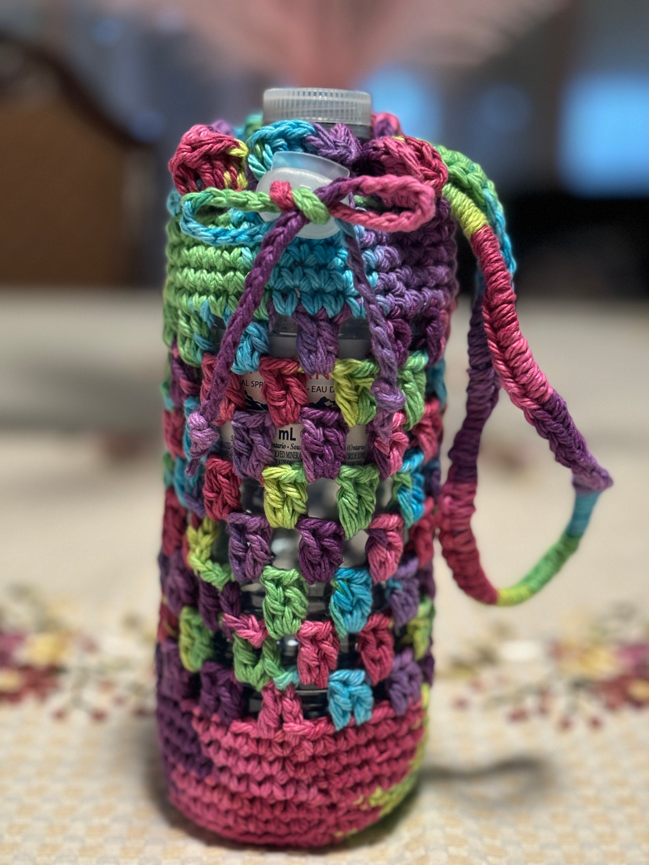 Rainbow crochet water bottle holder.