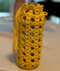 Crochet water bottle holder.