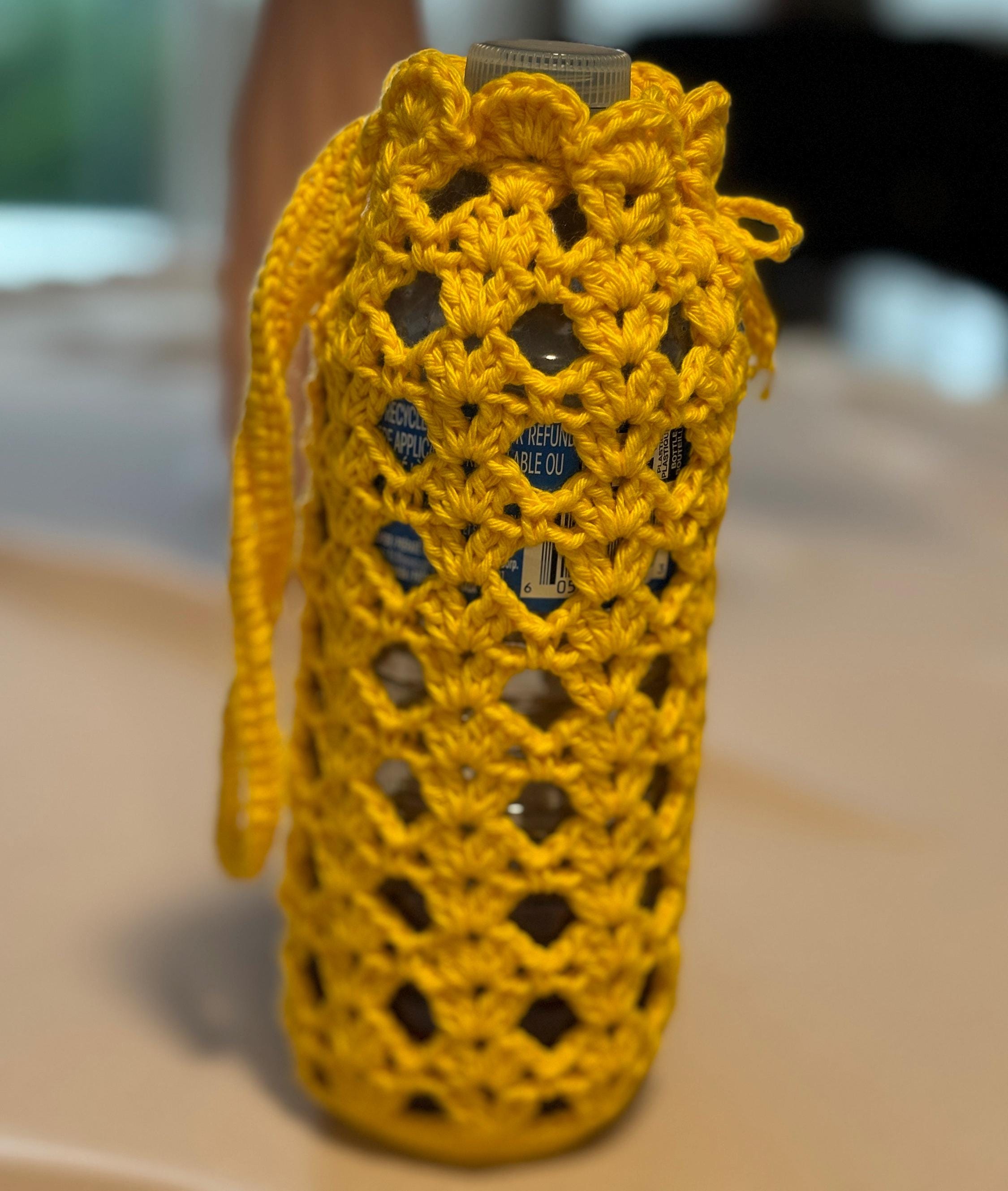 Crochet water bottle holder.